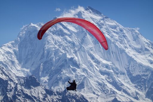 Pakistan 2021 Expedition _-127 Fabian Buhl flying with his ski Rakaposhi Picture by Francois Ragolski